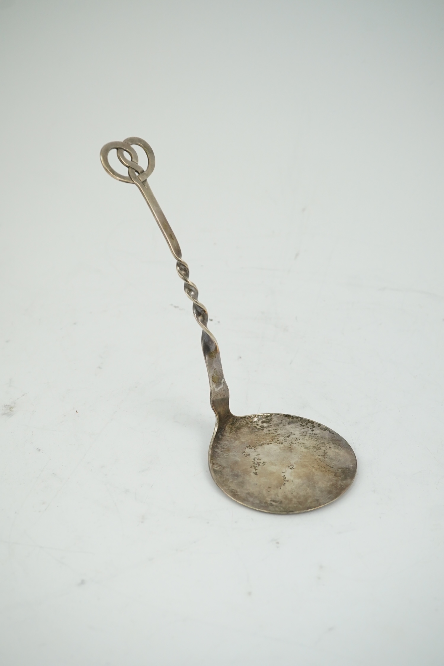 A George V Keswick School of Industrial Arts silver serving spoon, Chester, 1929, 17.5cm. Condition - fair